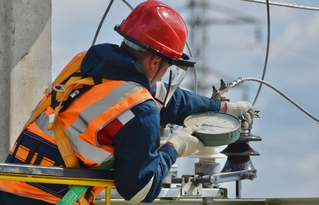 Engineer monitoring signal transmission equipment